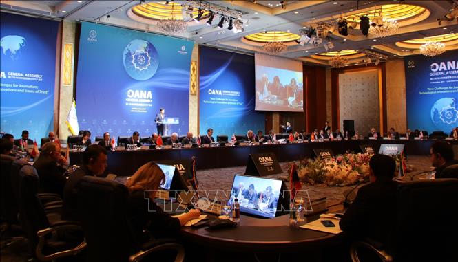 Photo: A session of the 17th OANA General Assembly. VNA Photo: Mạnh Hùng