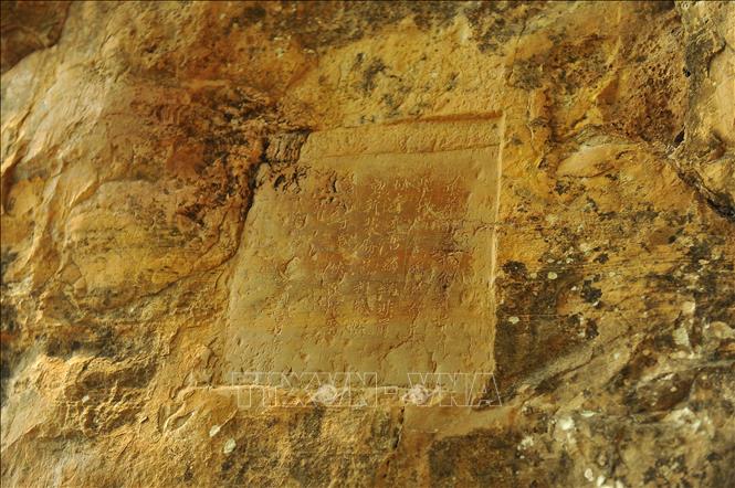 Photo: Le Thanh Tong King's poem was carved in stone inside the pagoda.  VNA Photo: Minh Đức