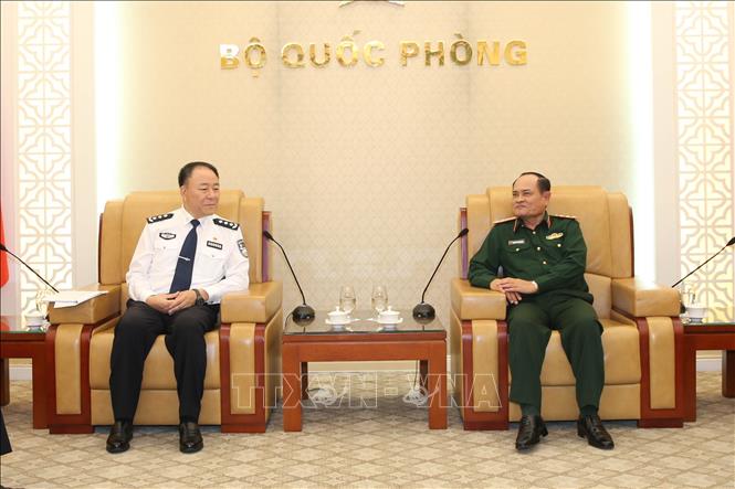 Trong ảnh: Thượng tướng Nguyễn Phương Nam và đồng chí Triệu Xương Hoa tại buổi tiếp. Ảnh: Hồng Pha – TTXVN phát