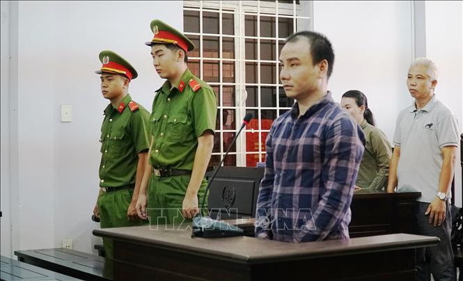 Trong ảnh: Bị cáo Trần Đình Trung tại phiên tòa. Ảnh: Thanh Tân - TTXVN