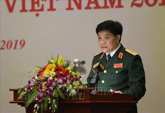 Trong ảnh: Thiếu tướng Nguyễn Văn Thân, Phó Viện trưởng Viện Chiến lược Quốc phòng giới thiệu nội dung Sách trắng Quốc phòng Việt Nam 2019. Ảnh: Dương Giang - TTXVN