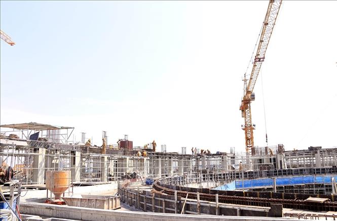 Trong ảnh: Công trình nhà Quốc hội mới của Lào - biểu tượng của tình đoàn kết Lào – Việt, do Tổng công ty 789-Binh đoàn 11 (Bộ Quốc phòng) thi công. Ảnh: Phạm Kiên – TTXVN  