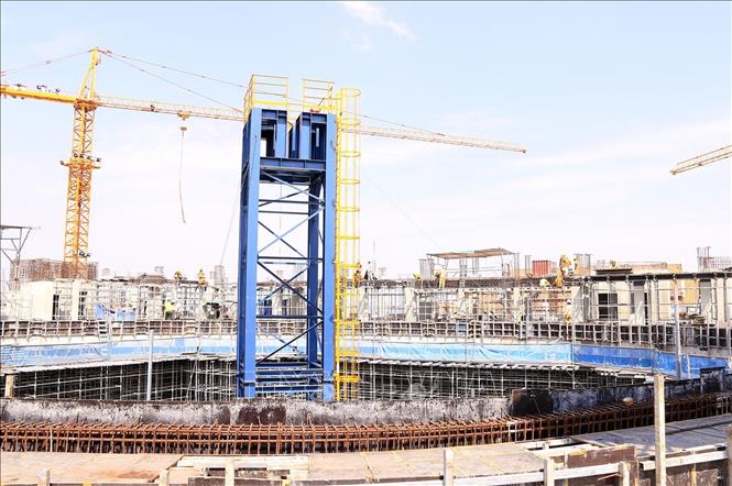 Trong ảnh: Công trình nhà Quốc hội mới của Lào - biểu tượng của tình đoàn kết Lào – Việt, do Tổng công ty 789-Binh đoàn 11 (Bộ Quốc phòng) thi công. Ảnh: Phạm Kiên – TTXVN  