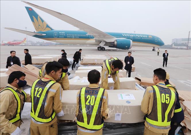 Photo: Bodies of Essex lorry victims arrive at Noi Bai international airport. VNA Photo: Lâm Khánh