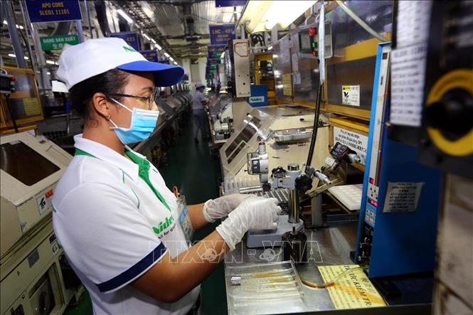 Photo: The Japan-invested Nidec Tosok Vietnam Co. Ltd. at Tan Thuan EPZ. VNA Photo: Danh Lam