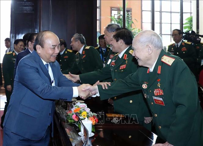 Trong ảnh: Thủ tướng Nguyễn Xuân Phúc với các đại biểu tham dự lễ kỷ niệm. Ảnh: Thống Nhất – TTXVN