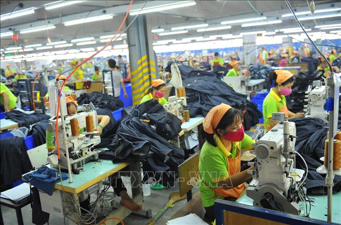 Photo: The Taiwan-invested Nien Hsing Textile Co. Ltd in Khanh Phu IZ, the northern province of Ninh Binh. VNA Photo: Minh Đức
