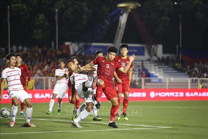 Photo: Striker Ha Duc Chinh (9) scored his third goal at the 68th minute to set a 4-0 victory over Cambodia. VNA Photo: Hoàng Linh