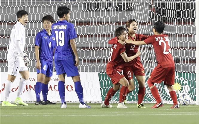 Photo: Vietnamese players celebrate their goal.  VNA Photo: Hoàng Linh