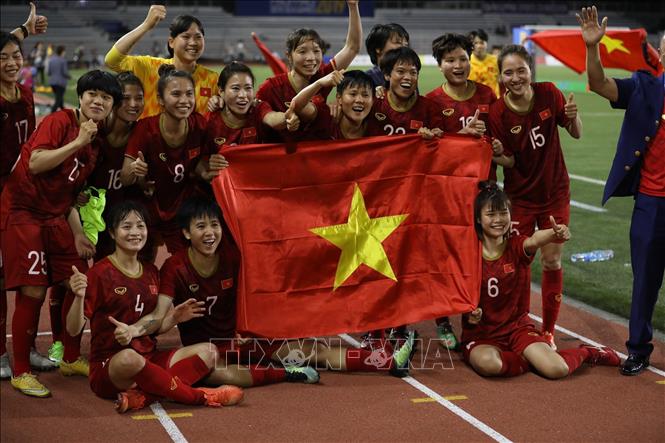 Photo: Vietnamese team celebrates their victory.  VNA Photo: Hoàng Linh