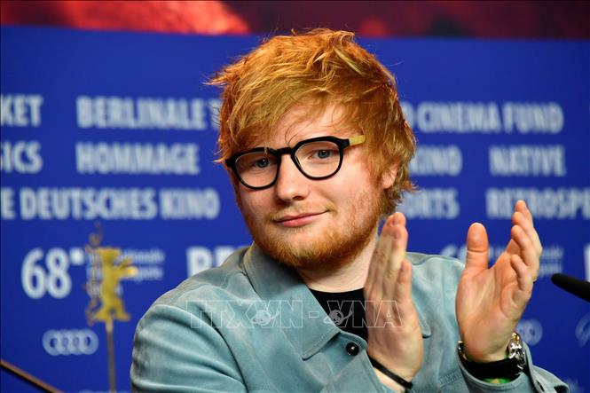 Trong ảnh: (tư liệu) Ca sĩ Ed Sheeran tại cuộc họp báo trong khuôn khổ Liên hoan Phim Berlin, Đức, ngày 23/2/2018. Ảnh: AFP/TTXVN