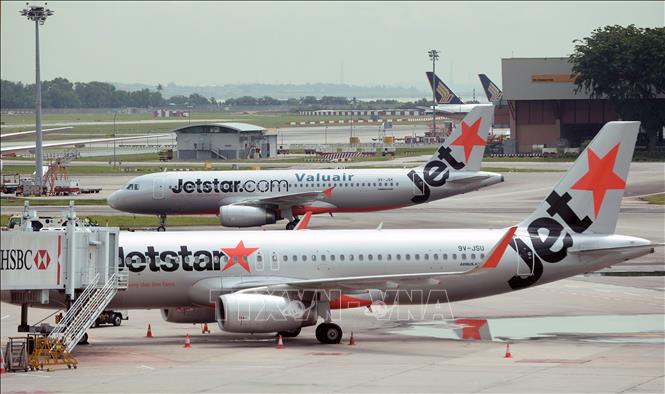 Trong ảnh: (tư liệu) Máy bay của hãng hàng không Jetstar Airway Australia tại sân bay quốc tế Changi, Singapore. Ảnh: AFP/TTXVN