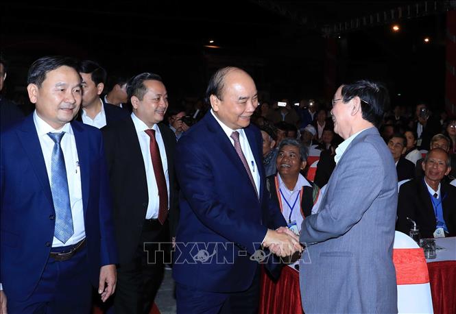 Trong ảnh: Thủ tướng Nguyễn Xuân Phúc và các đại biểu tham dự lễ kỷ niệm Ảnh: Thống Nhất – TTXVN
