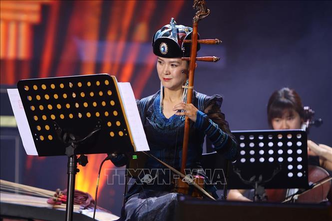 Trong ảnh: Tiết mục biểu diễn của nhóm Asia Music Ensemble Project. Ảnh: Thanh Vũ - TTXVN