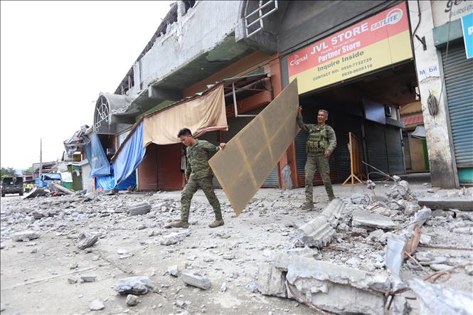 Trong ảnh: Cảnh đổ nát sau trận động đất ở đảo Mindanao, miền Nam Philippines ngày 16/12/2019. Ảnh: AFP/TTXVN