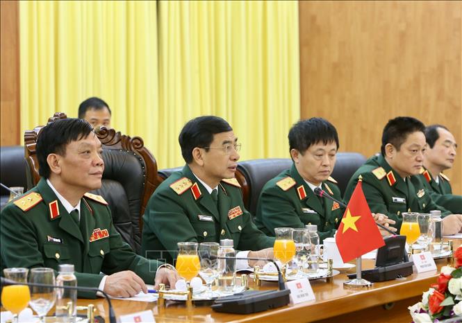 Trong ảnh: Thượng tướng Phan Văn Giang và đoàn quân sự cấp cao Việt Nam tham gia hội đàm. Ảnh: Dương Giang - TTXVN