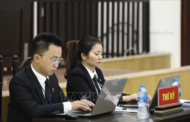 Trong ảnh: Thư ký phiên tòa. Ảnh: Văn Điệp – TTXVN
