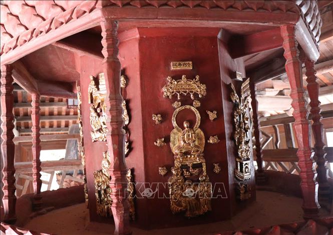 Trong ảnh: Họa tiết trang trí trên tòa cửu phẩm liên hoa. Ảnh: Thanh Thương – TTXVN