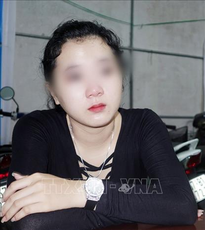 Trong ảnh: Huỳnh Thị Phương Anh tại cơ quan Công an. Ảnh: TTXVN phát