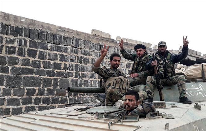 Trong ảnh: Binh sĩ Syria tại một khu vực ở tỉnh Idlib. Ảnh: AFP/TTXVN