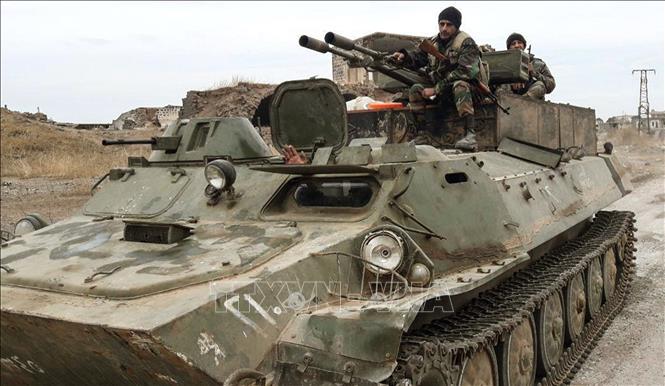Trong ảnh: Binh sĩ Syria tại một khu vực ở tỉnh Idlib. Ảnh: AFP/TTXVN