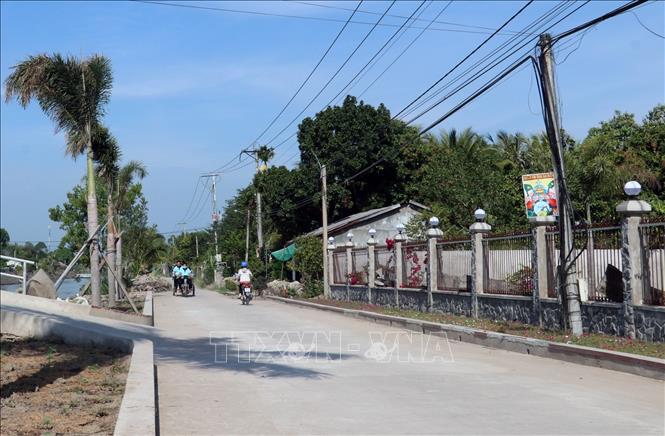 Trong ảnh: Đường giao thông nông thôn ở xã Tân Hiệp A, huyện Tân Hiệp (Kiên Giang).
Ảnh: Lê Huy Hải - TTXVN
