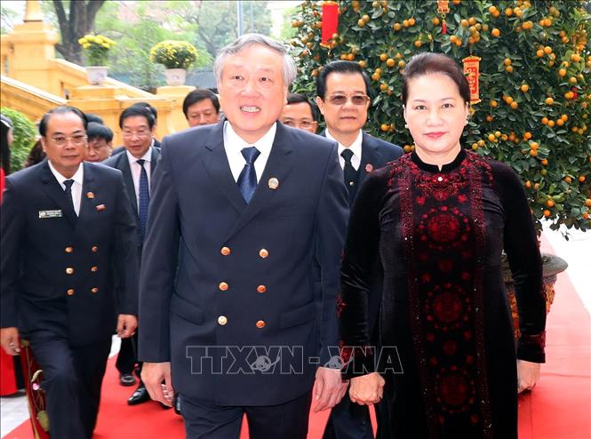 Trong ảnh: Chánh án Tòa án nhân dân tối cao Nguyễn Hòa Bình đón Chủ tịch Quốc hội Nguyễn Thị Kim Ngân đến dự hội nghị. Ảnh: Trọng Đức - TTXVN