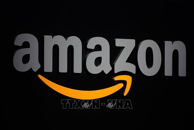 Trong ảnh: Biểu tượng Amazon. Ảnh: AFP/ TTXVN
