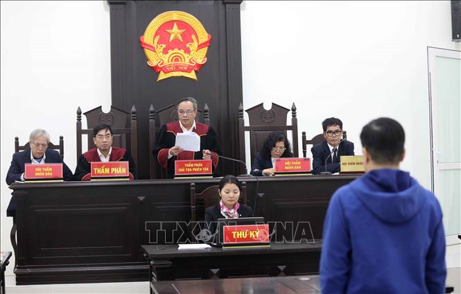 Trong ảnh: Quang cảnh phiên tòa. Ảnh: Doãn Tấn - TTXVN