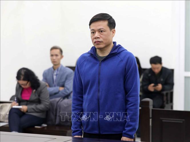 Trong ảnh: Bị cáo Nguyễn Hoàng Long (nguyên Chủ tịch HĐQT, Tổng Giám đốc Công ty CP Tập đoàn Vina Megastar) đứng trước tòa. Ảnh: Doãn Tấn - TTXVN