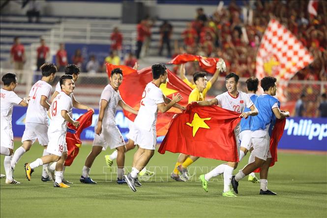 Trong ảnh: Các cầu thủ U22 Việt Nam lần đầu tiên giành huy chương Vàng bóng đá SEA Games 30. Ảnh: TTXVN