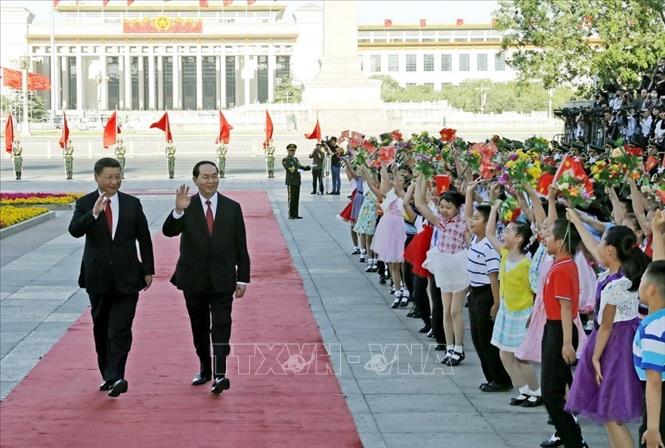 Trong ảnh: Tổng Bí thư, Chủ tịch Trung Quốc Tập Cận Bình chủ trì Lễ đón Chủ tịch nước Trần Đại Quang thăm cấp Nhà nước Trung Quốc, chiều 11/5/2017. Ảnh: Nhan Sáng-TTXVN