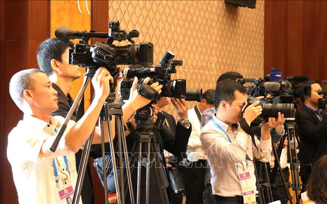 Photo: Reporters cover ASEAN SOM meeting on January 16. VNA Photo: Tiên Minh