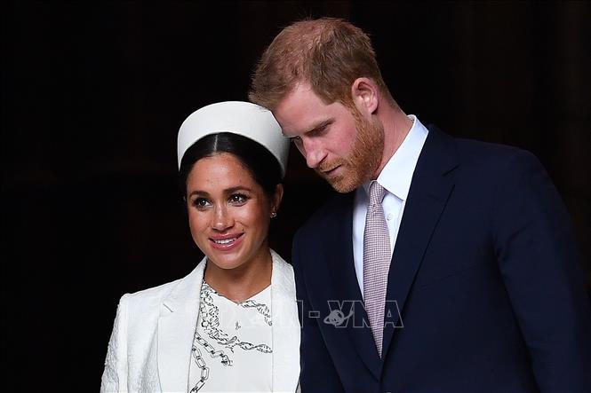 Trong ảnh (tư liệu): Hoàng tử Anh Harry (phải) và Công nương Meghan Markle (trái) sau khi tham dự một sự kiện ở London ngày 11/3/2019. Ảnh: AFP/TTXVN
