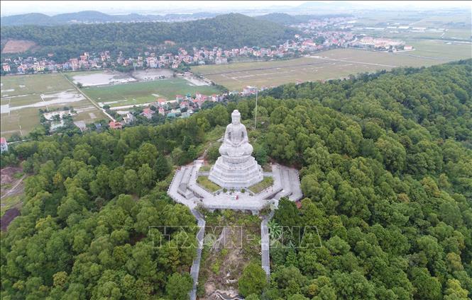 Photo: The Amitabha Buddha stone statue, 27 metres high and weighs more than 3,000 tonnes, built in 2007, is considered as one of the largest stone statues in Southeast Asia. VNA Photo: Thanh Thương