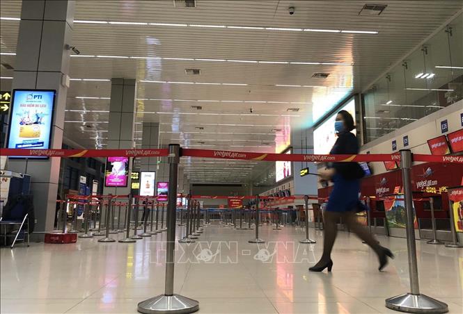 Trong ảnh: Vắng lặng là điểm dễ nhận thấy tại các điểm làm thủ tục của sân bay quốc tế Nội Bài (ảnh chụp sáng 14/2/2020) . Ảnh: Nhật Anh - TTXVN