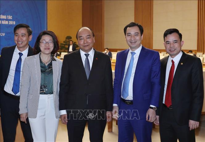 Trong ảnh: Thủ tướng Nguyễn Xuân Phúc và các đại biểu bên lề hội nghị. Ảnh: Thống Nhất – TTXVN
