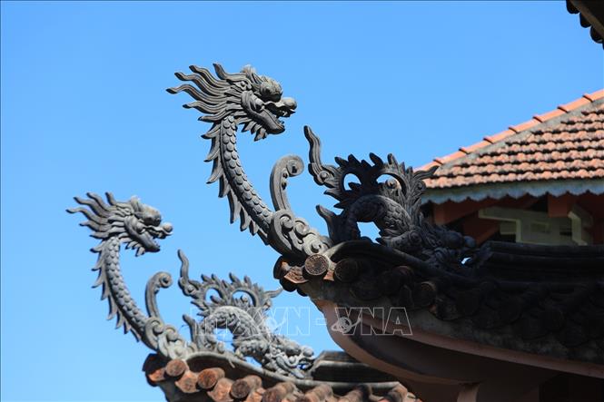Trong ảnh: Những đầu đao hình rồng tại chùa Bửu Minh. Ảnh: Thành Đạt - TTXVN