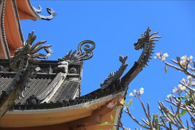Trong ảnh: Những nét trạm trổ rồng cổ kính tại chùa Bửu Minh. Ảnh: Thành Đạt - TTXVN