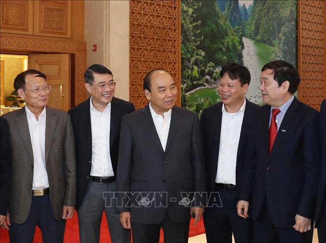 Trong ảnh: Thủ tướng Nguyễn Xuân Phúc với các thành viên Hội đồng Tư vấn và đại biểu dự hội nghị. Ảnh: Thống Nhất – TTXVN