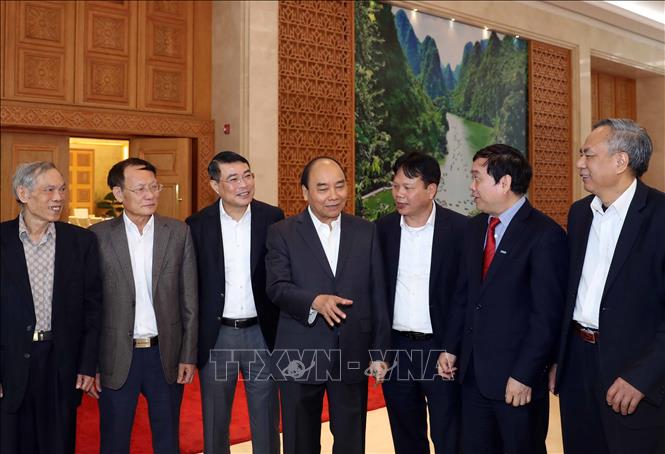 Trong ảnh: Thủ tướng Nguyễn Xuân Phúc với các thành viên Hội đồng Tư vấn và đại biểu dự hội nghị. Ảnh: Thống Nhất – TTXVN