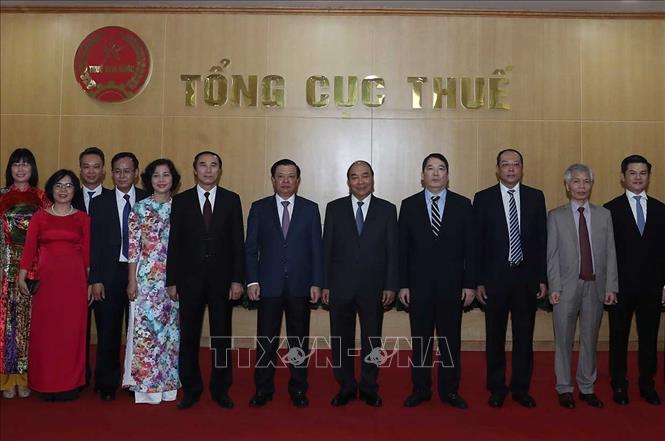 Trong ảnh: Thủ tướng Nguyễn Xuân Phúc với các đại biểu. Ảnh: Thống Nhất – TTXVN
