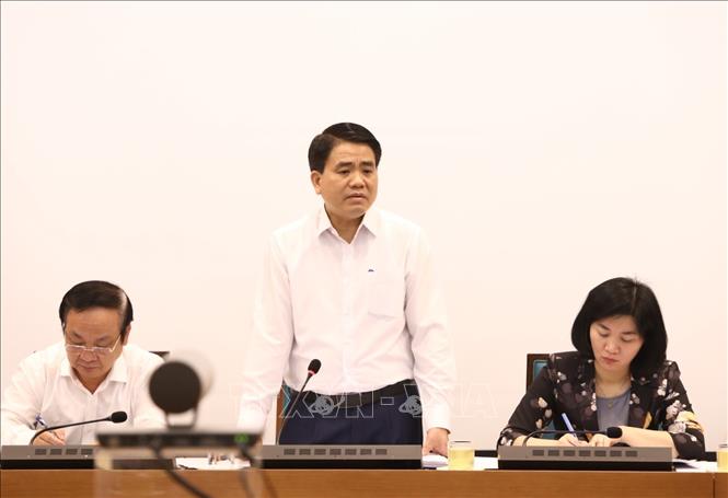 Trong ảnh: Chủ tịch Uỷ ban nhân dân Thành phố Hà Nội Nguyễn Đức Chung phát biểu chỉ đạo cuộc họp. Ảnh: Văn Điệp - TTXVN
