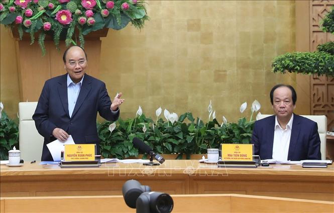 Photo: PM Nguyen Xuan Phuc speaks at the conference. VNA Photo: Thống Nhất