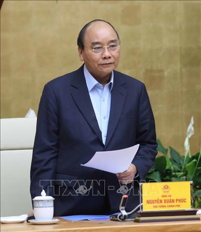 Photo: PM Nguyen Xuan Phuc speaks at the conference. VNA Photo: Thống Nhất