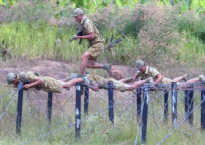 Trong ảnh: Chiến sĩ Lữ đoàn Đặc công 429 ngày đêm khổ công tập luyện để tinh thông kỹ năng “luồn sâu đánh hiểm”. Ảnh: TTXVN phát