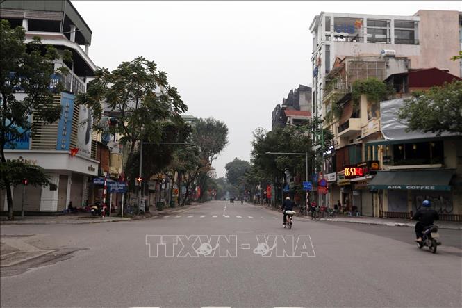 Trong ảnh: Ngã tư Nguyễn Du – Phố Huế, Hà Nội vắng người ngày 20/3/2020. Ảnh: Anh Tuấn – TTXVN