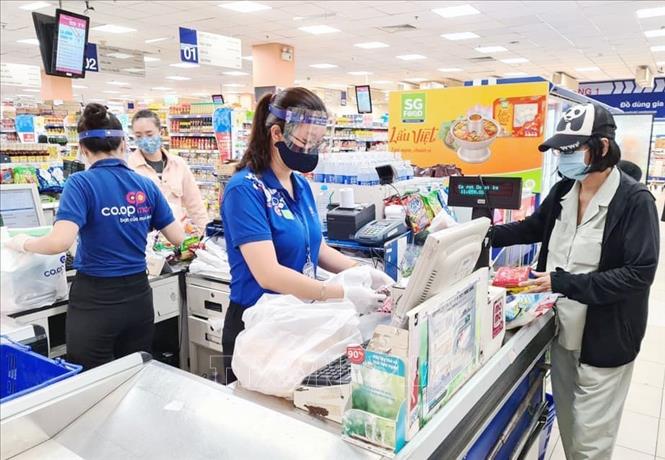 Trong ảnh: Các điểm bán thuộc Saigon Co.op đảm bảo quy định phòng, chống dịch bệnh COVID-19.
Ảnh: TTXVN phát