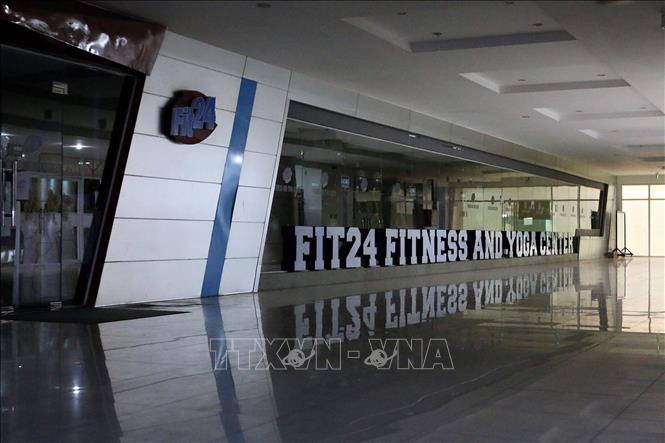 Trong ảnh: Phòng tập thể hình - Fit 24 Fitness and Yoga Center trên đường Bà Huyện Thanh Quan, Quận 3 tạm dừng hoạt động phòng, chống dịch COVID-19. Ảnh: Thanh Vũ - TTXVN
