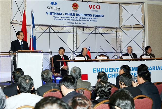 Trong ảnh: Chủ tịch nước Nguyễn Minh Triết phát biểu tại Diễn đàn Doanh nghiệp Việt Nam – Chile trong chuyến thăm chính thức Chile từ ngày 29/9 – 1/10/2009. Ảnh: Nguyễn Khang - TTXVN